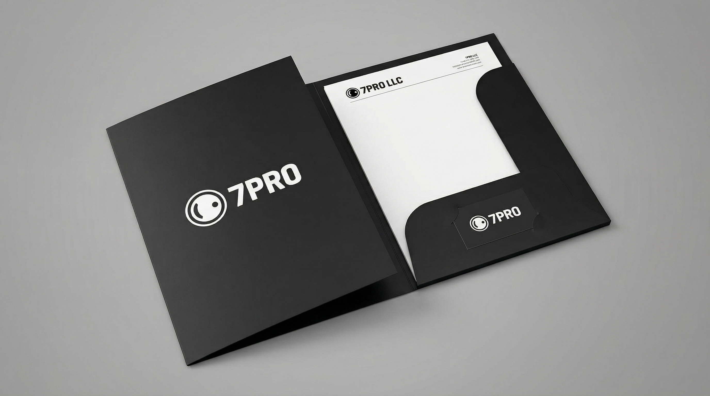 7PRO LLC corporate presentation folder with interior pockets and business card slot, featuring professional black design
